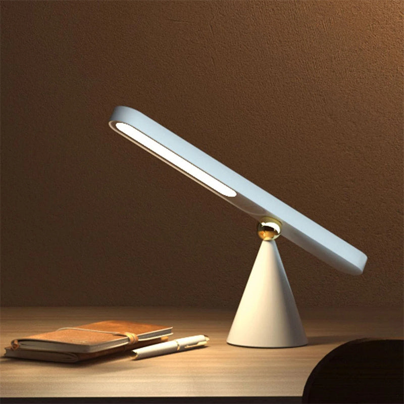 A multifunctional, geometrically visually creative, wireless table and wall lamp that can be attached with a magnet