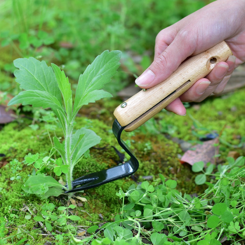 Instruments dārza ravēšanai un stādu iesakņošanai