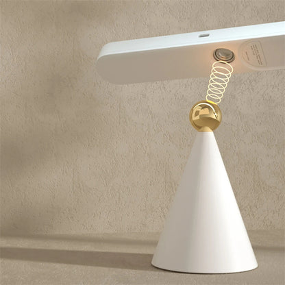 A multifunctional, geometrically visually creative, wireless table and wall lamp that can be attached with a magnet